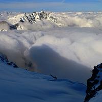  Mer de nuages et le reflet de l'aiguille du St Esprit: célérité divine